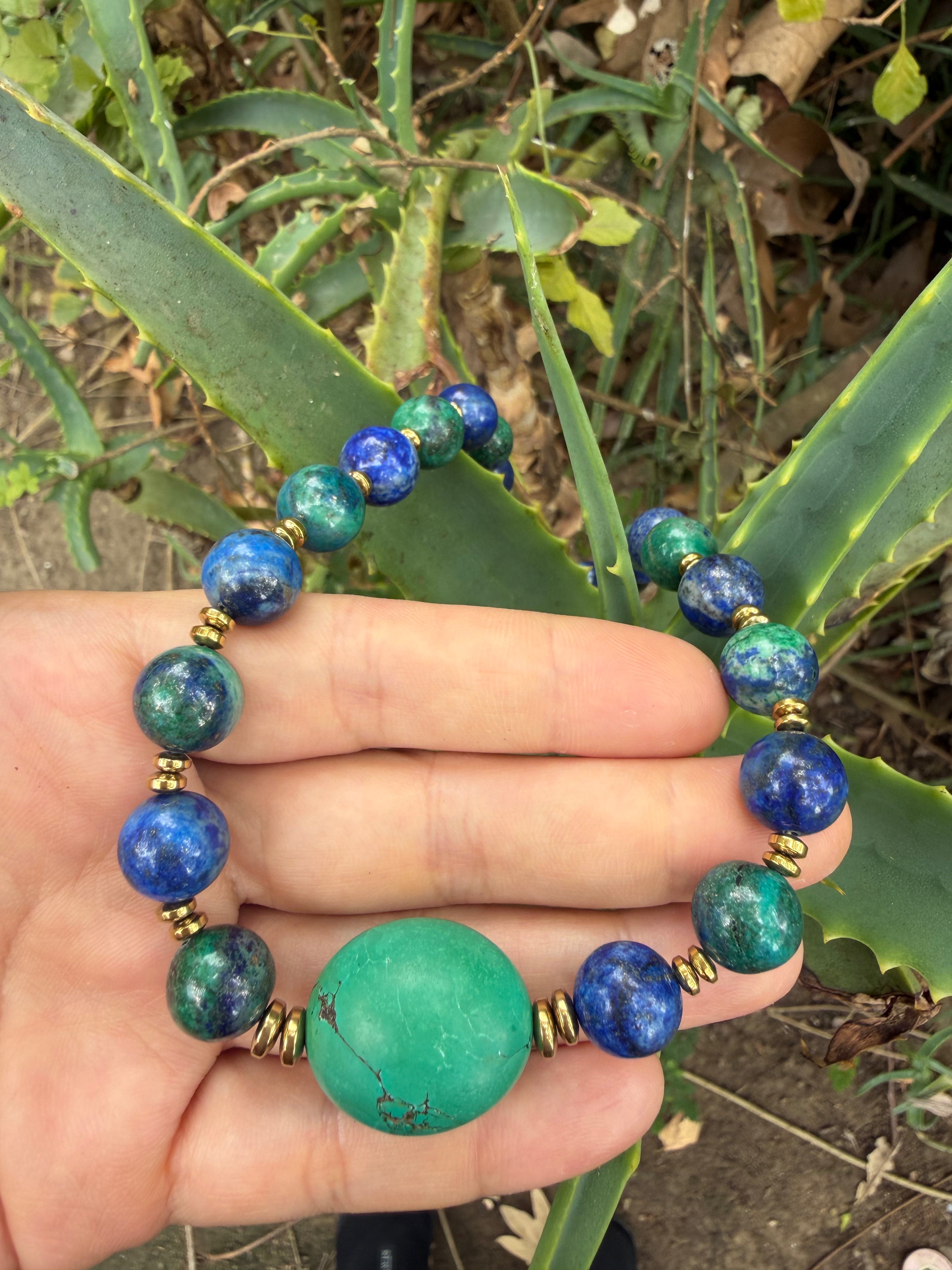 Close-up detail of the natural magnesite turquoise focal stone with color-retentive gold-plated hematite accents.⁠