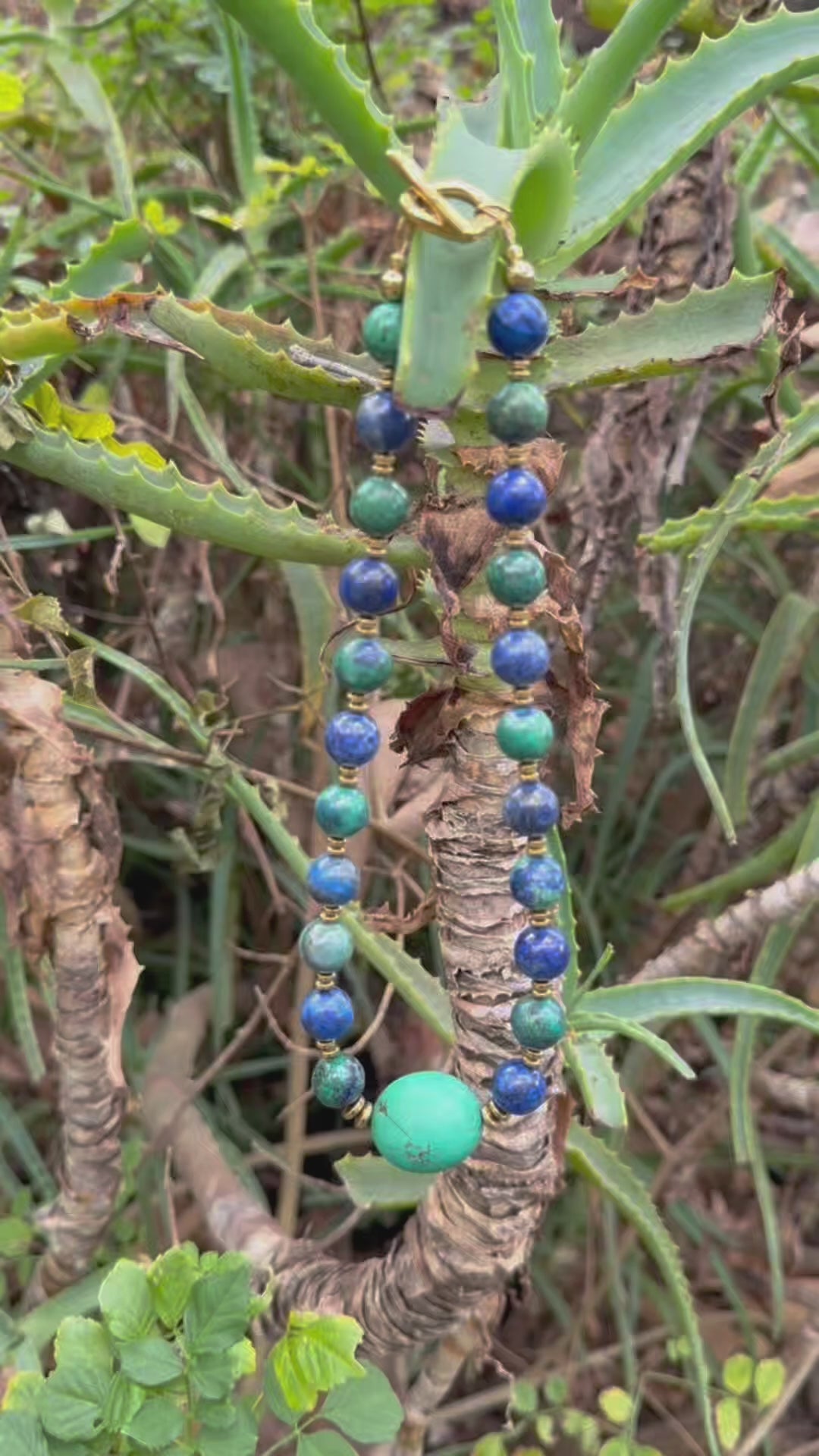 ⁠Model wearing the natural Phoenix Turquoise beaded necklace showing its 17.8 inch length and drop.⁠